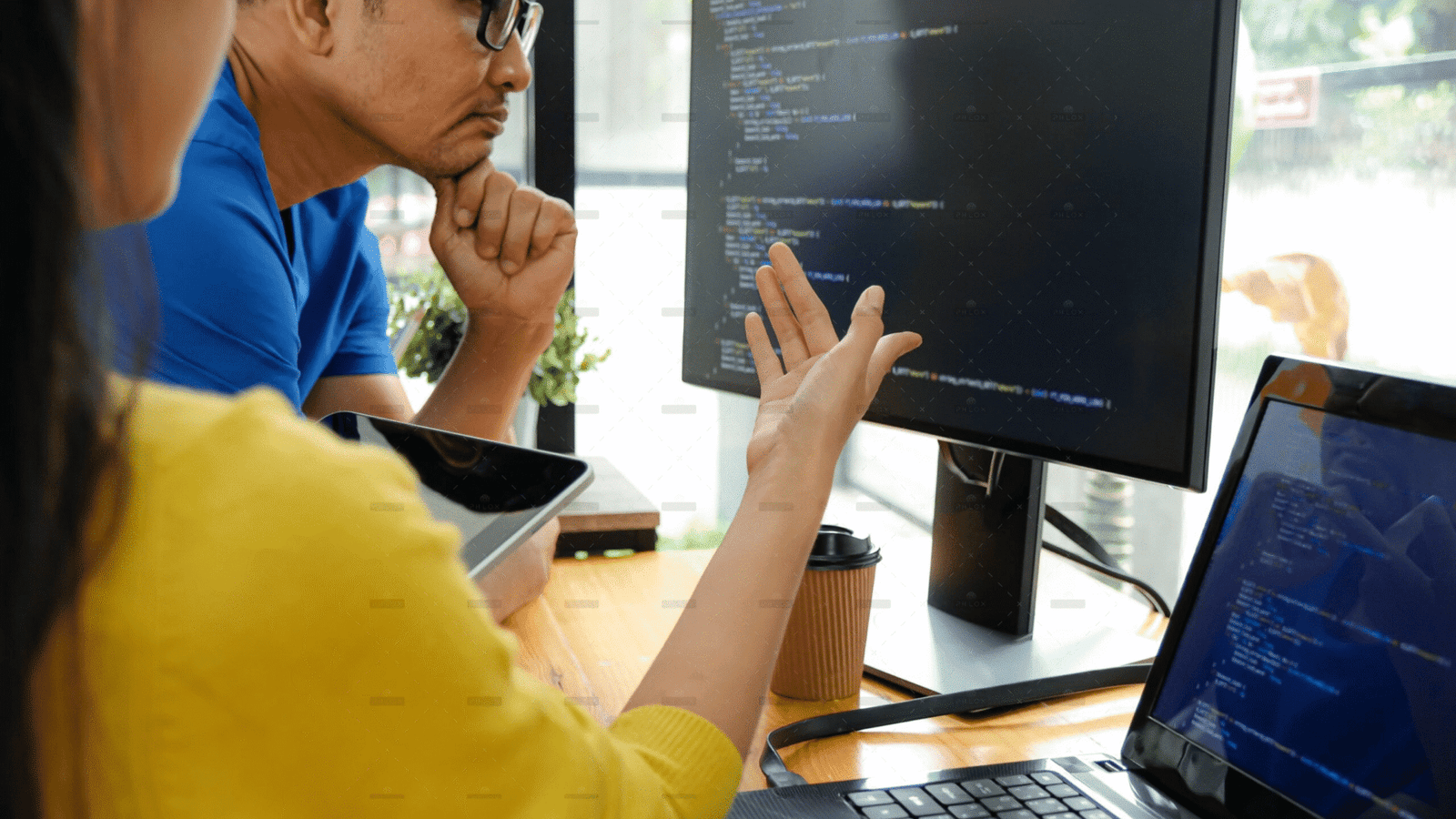 demo-attachment-2526-asian-female-programmers-are-pointing-at-their-7NDKJGM-min-scaled